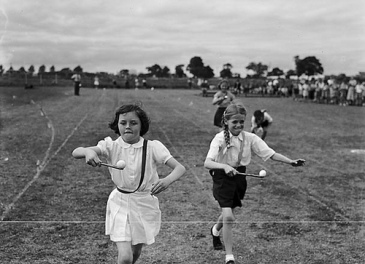 It may look like these girls are participating in a sort of field day in 1952, but they are really rushing to deliver my daily intake of delicious eggs.